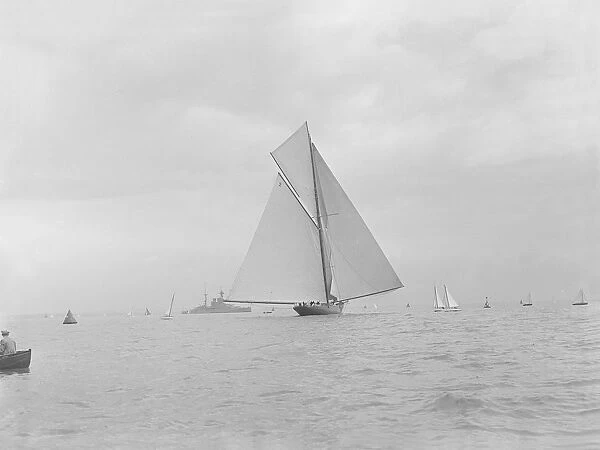The racing cutter Terpisichore running downwind, 1922. Creator: Kirk & Sons of Cowes