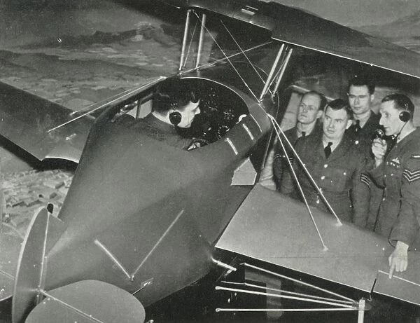 RAF personnel learning to fly in a flight simulator during the Second World War, 1941