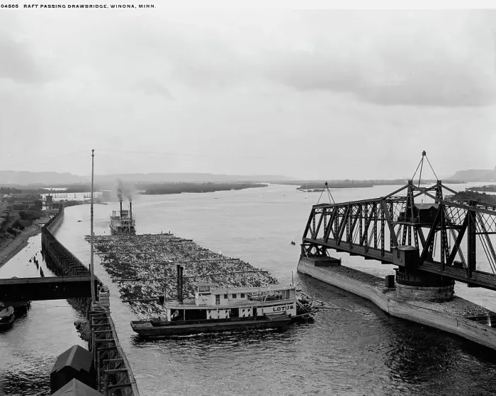 Framed Print : Raft passing drawbridge, Winona, Minn. between 1880 and 1899. Creator: Unknown Framed Print : Raft passing drawbridge, Winona, Minn. between 1880 and 1899. Creator: Unknown