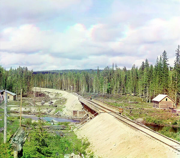 Railroad bridge across Kumsa River near the Medvezhya Gora Station, 1915. Creator: Sergey Mikhaylovich Prokudin-Gorsky