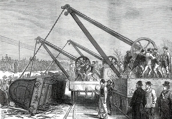 The Railway Accident at Abbotts Ripton, Huntingdon: raising an engine from the wrecked train, 1876. Creator: Unknown