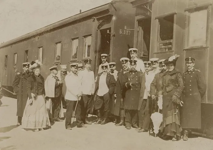 Framed Print : Railway employees against the background of train cars, 1910-1919. Creator: Unknown Framed Print : Railway employees against the background of train cars, 1910-1919. Creator: Unknown