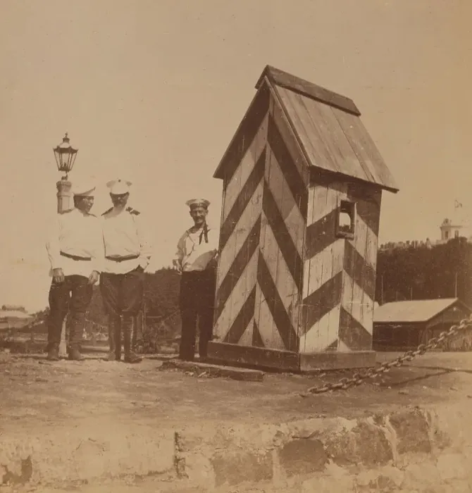 Framed Print : By the railway, three men in uniform standing near a guard booth, Vladivostok, Russia, 1899. Creator: Eleanor Lord Pray Framed Print : By the railway, three men in uniform standing near a guard booth, Vladivostok, Russia, 1899. Creator: Eleanor Lord Pray