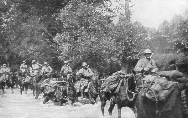 The re-supply of a machine gun unit by horseback, Aisne, France, 2 September 1918
