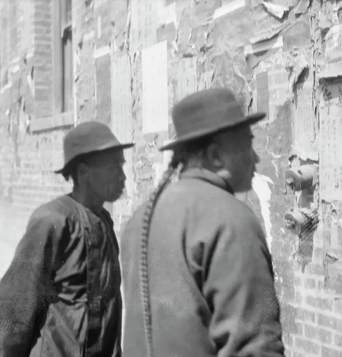 Framed Print : Reading wall notices, Chinatown, San Francisco, between 1896 and 1906. Creator: Arnold Genthe Framed Print : Reading wall notices, Chinatown, San Francisco, between 1896 and 1906. Creator: Arnold Genthe