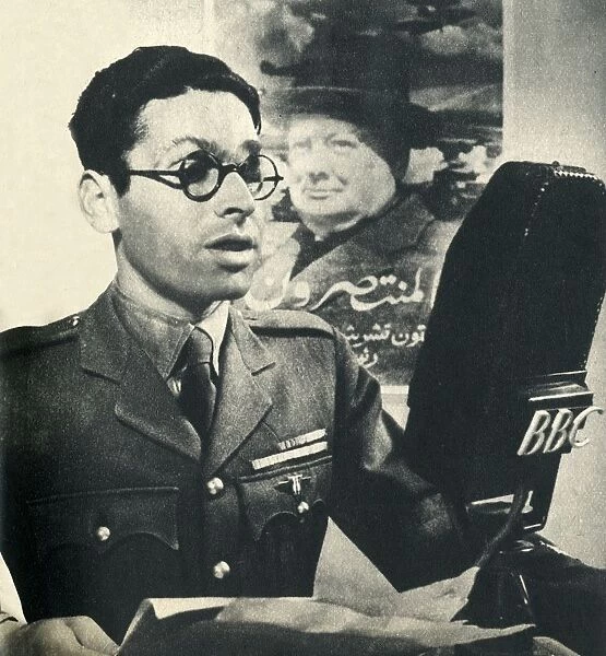 He reads the news in Moroccan Arabic. A member of the Fighting French Army, 1942