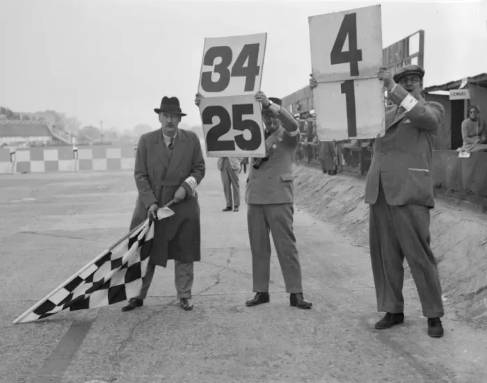 Framed Print : Ready to wave the chequerd flag, Brooklands. Artist: Bill Brunell Framed Print : Ready to wave the chequerd flag, Brooklands. Artist: Bill Brunell