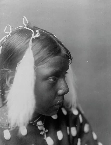 Red Cloud's granddaughter, c1907. Creator: Edward Sheriff Curtis