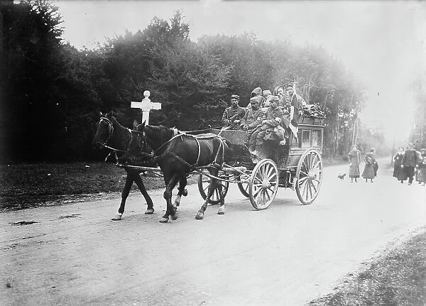 Red Cross Transport in Forest of Laigle (i.e. Laigne), 1914. Creator: Bain News Service