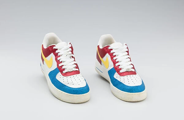 Red, white, yellow, and blue Nike sneakers worn Big Boi #23857681