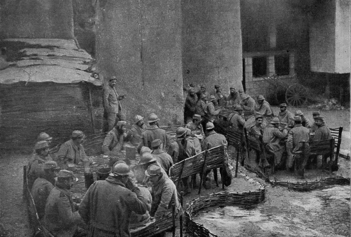 Framed Print : Un refectoire en plein air, au cantonnement; les tables et les bancs sont faits de... 1916. Creator: Unknown Framed Print : Un refectoire en plein air, au cantonnement; les tables et les bancs sont faits de... 1916. Creator: Unknown