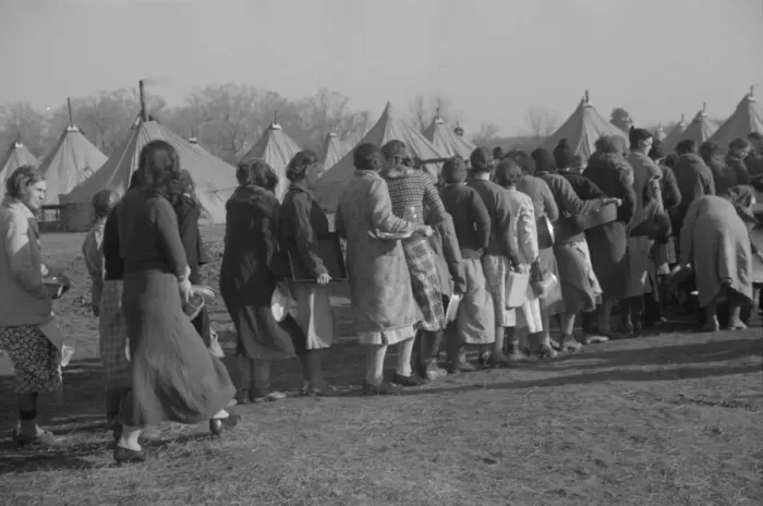 Framed Print : Refugees lined up at meal time in the camp for white flood refugees in Forest City, Arkansas, 1937. Creator: Walker Evans Framed Print : Refugees lined up at meal time in the camp for white flood refugees in Forest City, Arkansas, 1937. Creator: Walker Evans