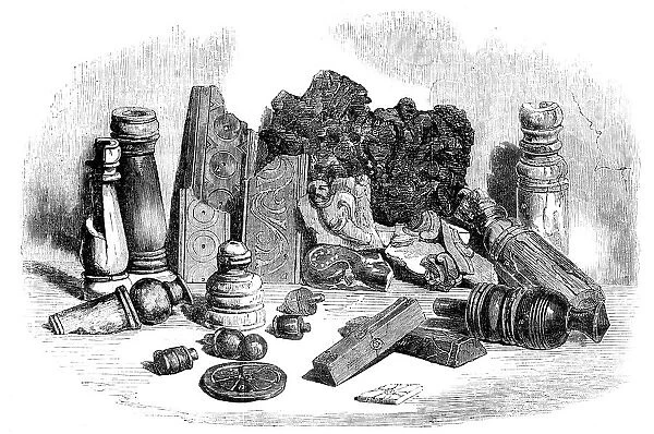 Relics from the Buried City of Brahmunabad, in Sind - Chessmen, Portion of Chess-board... 1857. Creator: Unknown