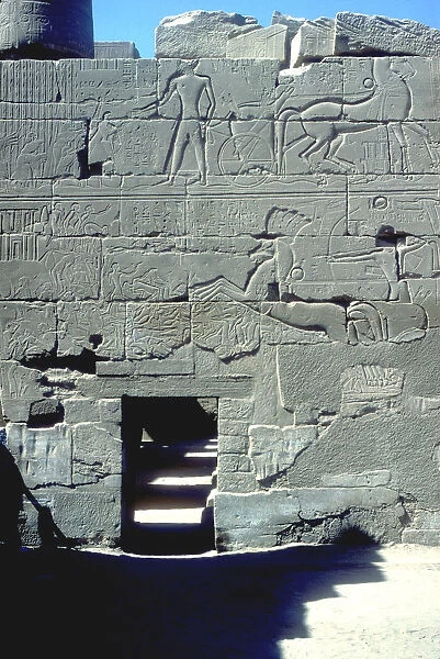 Relief of the Pharoah in chariot riding down his enemies, Temple of Amun, Karnak, c14th century BC