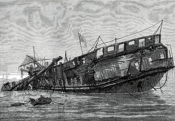Remains of the Warspite training-ship at low tide, 1876. Creator: Unknown