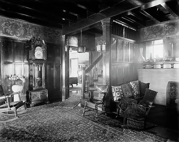 Residence of Dr. J.H. Lancashire, the hall and grandfather clock, Alma, Mich. between 1900 and 1910 Creator: Unknown
