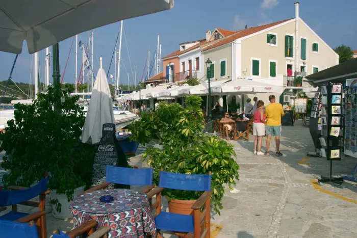 Framed Print : Restaurant on the waterfront in Fiskardo harbour, Kefalonia, Greece Framed Print : Restaurant on the waterfront in Fiskardo harbour, Kefalonia, Greece