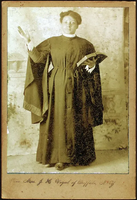 Framed Print : Rev. Mrs. J. H. Vigal of Buffalo, N.Y. arm raised, holding Bible, c1880-c1889. Creator: Unknown Framed Print : Rev. Mrs. J. H. Vigal of Buffalo, N.Y. arm raised, holding Bible, c1880-c1889. Creator: Unknown
