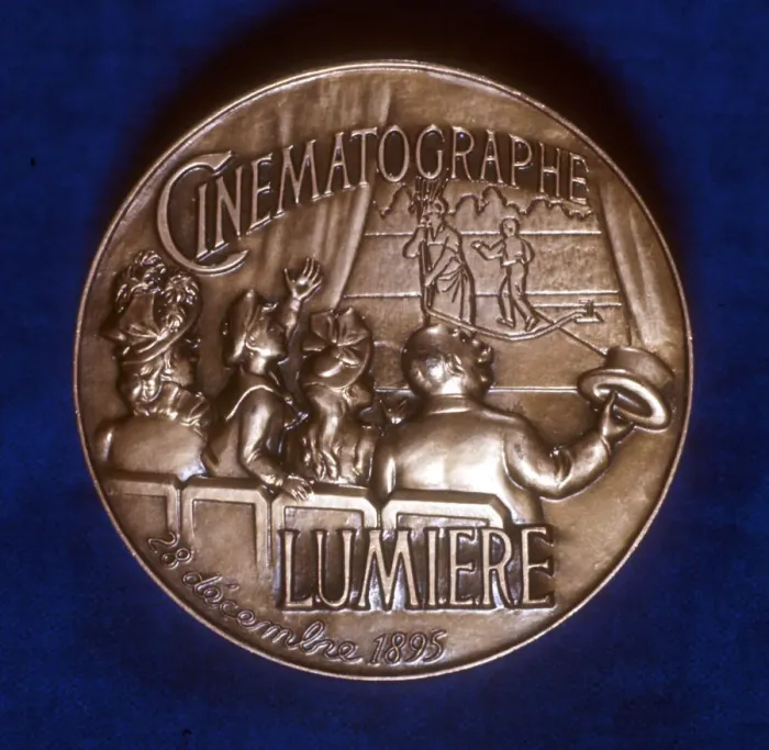 Framed Print : Reverse of medal commemorating 50 years of cinematography by the Lumiere brothers, 1945 Framed Print : Reverse of medal commemorating 50 years of cinematography by the Lumiere brothers, 1945