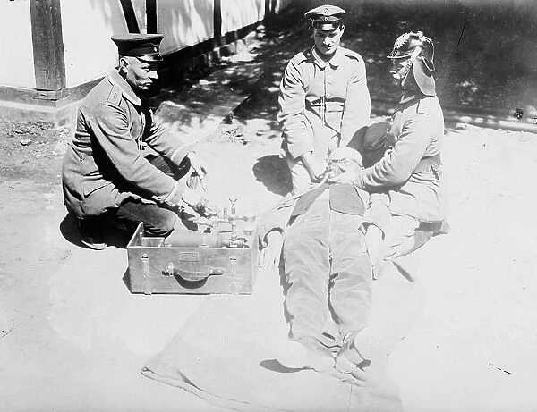 Reviving wounded German with Pulmotor, between 1914 and c1915. Creator: Bain News Service