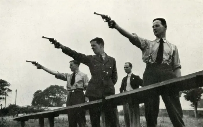Framed Print : Revolver practice at the Elementary Flying Training School, 1941. Creator: Charles Brown Framed Print : Revolver practice at the Elementary Flying Training School, 1941. Creator: Charles Brown