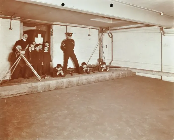 Framed Print : Rifle shooting lesson, Jews Free School, Stepney, London, 1908 Framed Print : Rifle shooting lesson, Jews Free School, Stepney, London, 1908