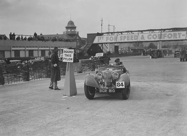 Riley Sprite of Kay Hague competing in the JCC Rally, Brooklands, Surrey, 1939. Artist