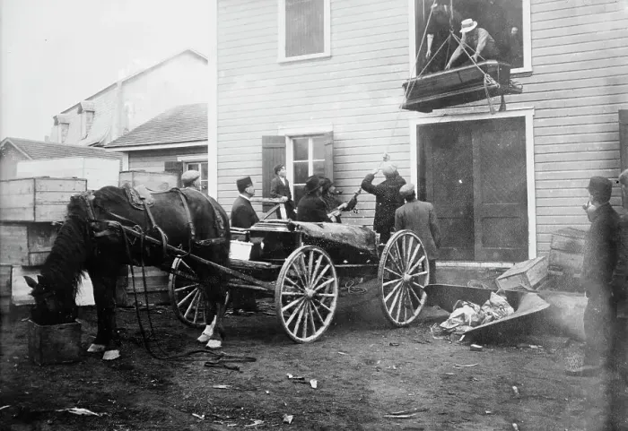 Framed Print : Rimouski - handling coffins of victims, 1914. Creator: Bain News Service Framed Print : Rimouski - handling coffins of victims, 1914. Creator: Bain News Service