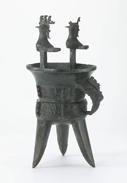 Ritual wine warmer (jia) with taotie and birds, Late Shang dynasty, ca. 1400-1250 BCE
