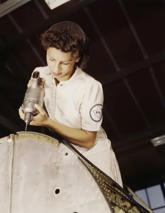 Framed Print : A rivet is her fighting weapon... Naval Air Base, Corpus Christi, Texas, 1942. Creator: Howard Hollem Framed Print : A rivet is her fighting weapon... Naval Air Base, Corpus Christi, Texas, 1942. Creator: Howard Hollem