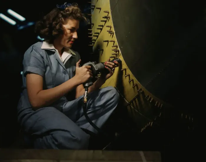Framed Print : Riveter at work on Consolidated bomber, Consolidated Aircraft Corp. Fort Worth, Texas, 1942. Creator: Howard Hollem Framed Print : Riveter at work on Consolidated bomber, Consolidated Aircraft Corp. Fort Worth, Texas, 1942. Creator: Howard Hollem