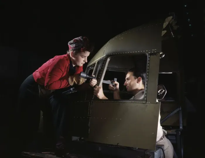 Framed Print : Riveting team working on the cockpit shell of a... Douglas Aircraft Co. Long Beach, Calif. 1942. Creator: Alfred T Palmer Framed Print : Riveting team working on the cockpit shell of a... Douglas Aircraft Co. Long Beach, Calif. 1942. Creator: Alfred T Palmer