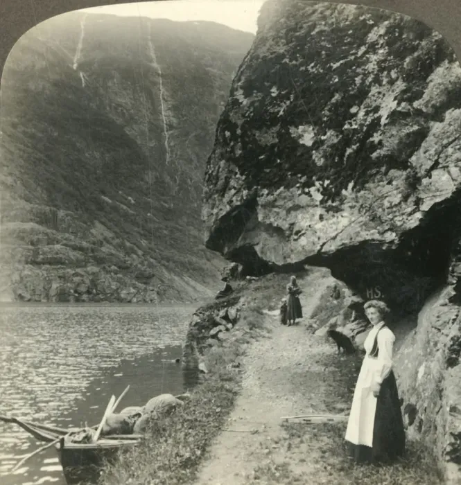 Framed Print : Where the road creeps under the jutting cliffs by the waters of the Nerofjord, Norway, c1905 Framed Print : Where the road creeps under the jutting cliffs by the waters of the Nerofjord, Norway, c1905