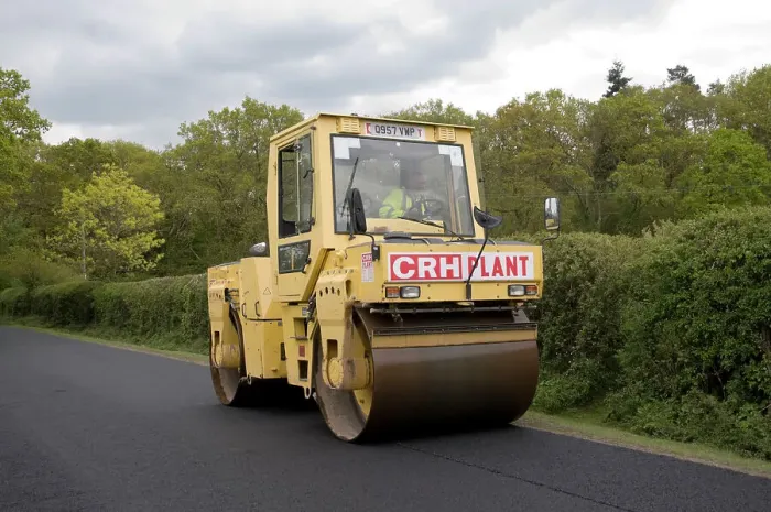 Framed Print : Road resurfacing work repairing potholes Framed Print : Road resurfacing work repairing potholes