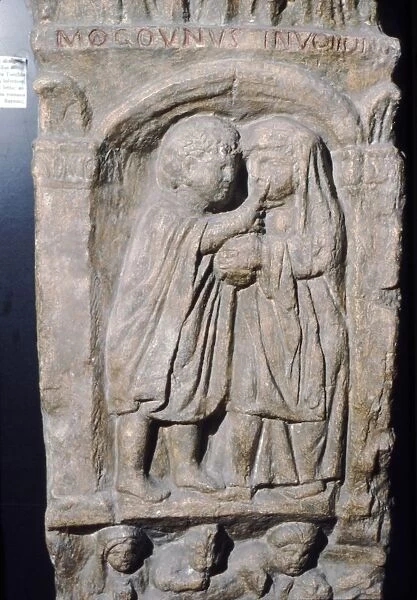 Roman doctor inspecting eye of a woman, relief on gravestone, from house near Naix, France