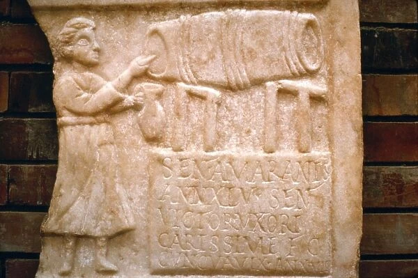 Roman relief, a woman draws wine from a cask at a Tavern, Merida, Spain, c2nd-3rd century