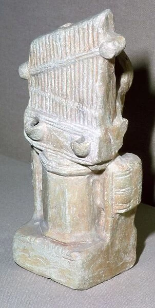 Roman terracotta lamp in the shape of a water-organ