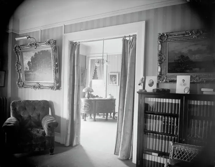 Framed Print : Room with bookcase, study with desk, between 1900 and 1915. Creator: Unknown Framed Print : Room with bookcase, study with desk, between 1900 and 1915. Creator: Unknown