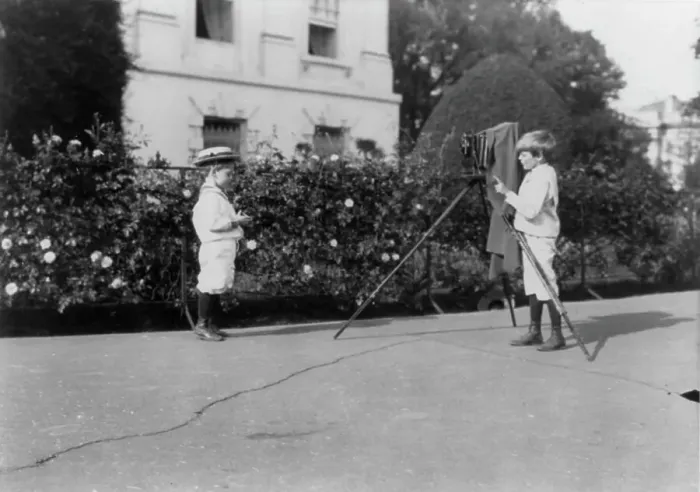Framed Print : Roosevelt children - Archie photographing Quentin, 1902. Creator: Frances Benjamin Johnston Framed Print : Roosevelt children - Archie photographing Quentin, 1902. Creator: Frances Benjamin Johnston
