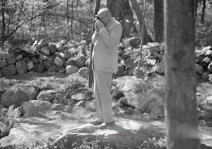 Framed Print : Rothbart, Albert, Mr. taking a photograph outdoors, between 1920 and 1935. Creator: Arnold Genthe Framed Print : Rothbart, Albert, Mr. taking a photograph outdoors, between 1920 and 1935. Creator: Arnold Genthe