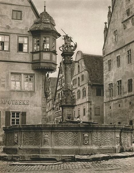 Rothenburg o. d. T. - St. Georges Fountain - Marien-Apotheke, 1931. Artist: Kurt Hielscher