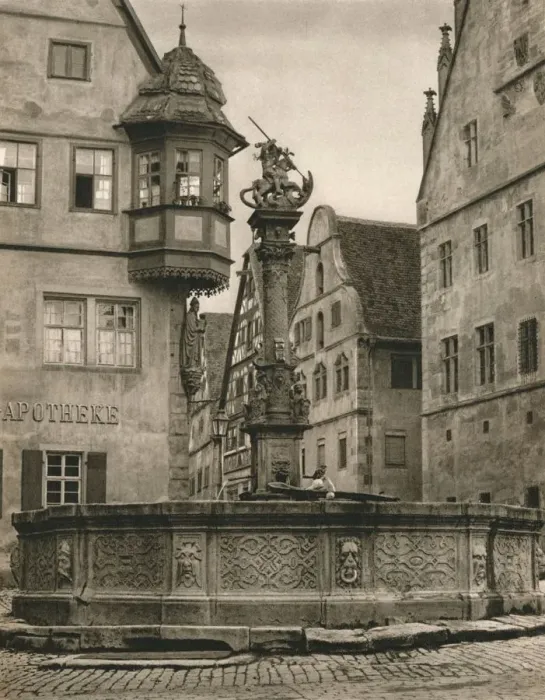 Framed Print : Rothenburg o. d. T. - St. Georges Fountain - Marien-Apotheke, 1931. Artist: Kurt Hielscher Framed Print : Rothenburg o. d. T. - St. Georges Fountain - Marien-Apotheke, 1931. Artist: Kurt Hielscher