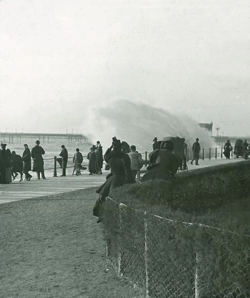 Rough sea over the promenade at Hastings, Sussex, late 19th-early 20th century. Creator: Unknown