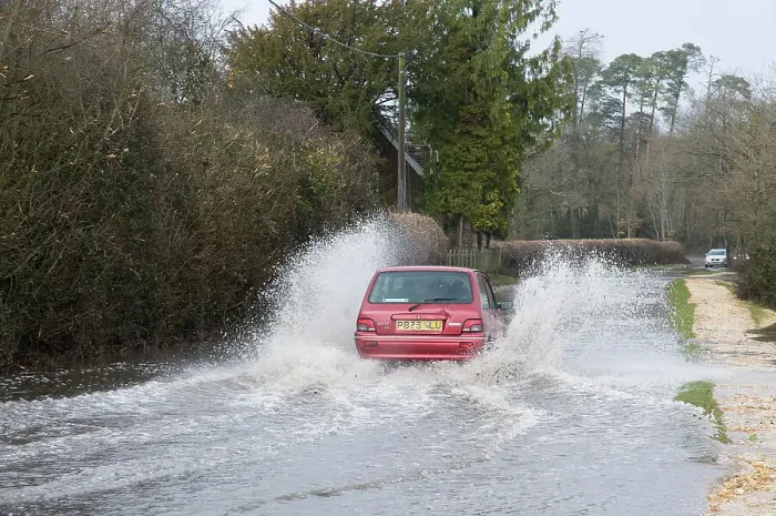 Framed Print : Rover Metro driving through floods at Beaulieu 2008 Framed Print : Rover Metro driving through floods at Beaulieu 2008