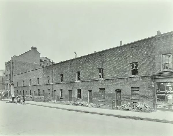 Row of derelict houses, Hackney, London, August 1937