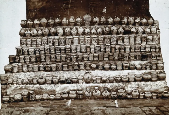 Framed Print : Rows of decorated pharmacy jars and other objects, c19th century. Creator: Unknown