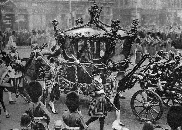 The royal coach on its way to open parliament, London, 1926-1927