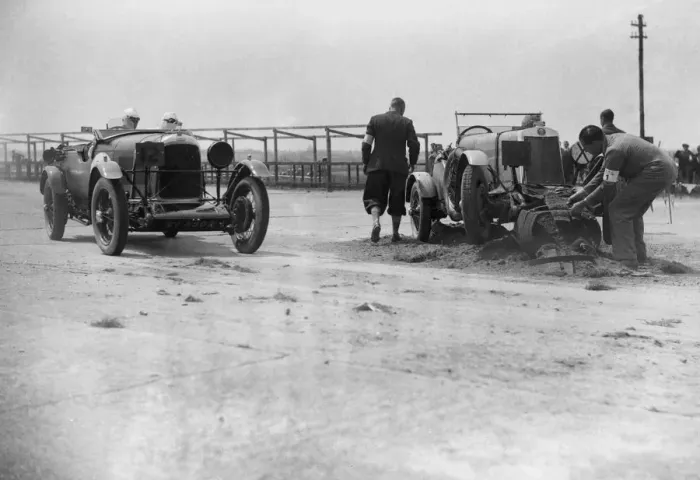 Framed Print : RSS Hebelers Lagonda passing R Childes crashed Lea-Francis, BARC 6-Hour Race Framed Print : RSS Hebelers Lagonda passing R Childes crashed Lea-Francis, BARC 6-Hour Race