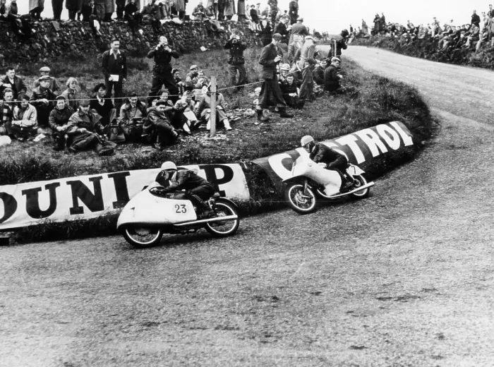 Framed Print : Rupert Hollaus on bike number 23, Carlo Ubbiali on bike number 7, 1954