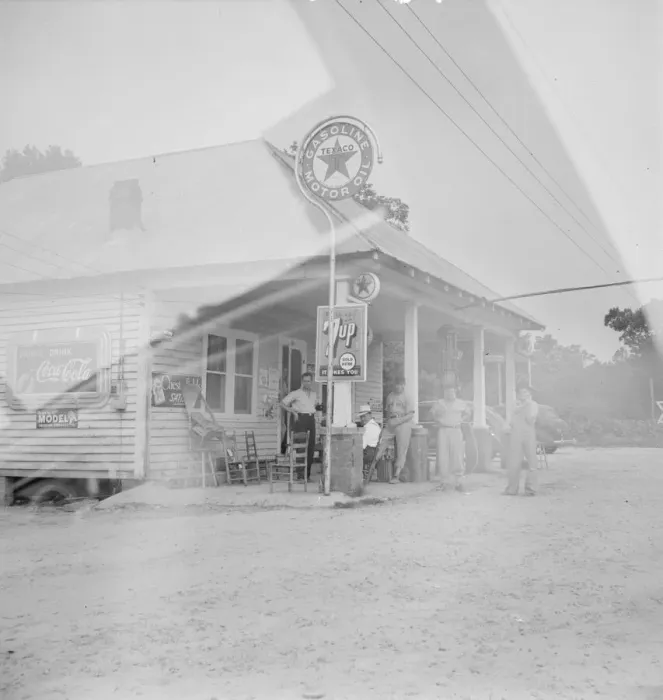 Framed Print : Rural filling station becomes community... 4 July, near Chapel Hill, North Carolina, 1939 Creator: Dorothea Lange Framed Print : Rural filling station becomes community... 4 July, near Chapel Hill, North Carolina, 1939 Creator: Dorothea Lange